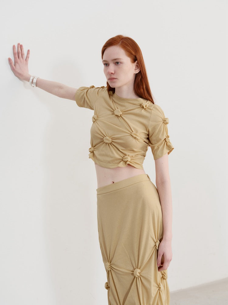 Twist Knot Plisserad kortärmad T-shirt