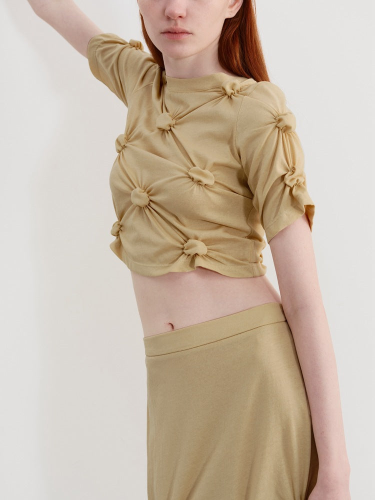 Twist Knot Plisserad kortärmad T-shirt